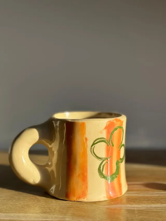 Clover mug with orange stripes